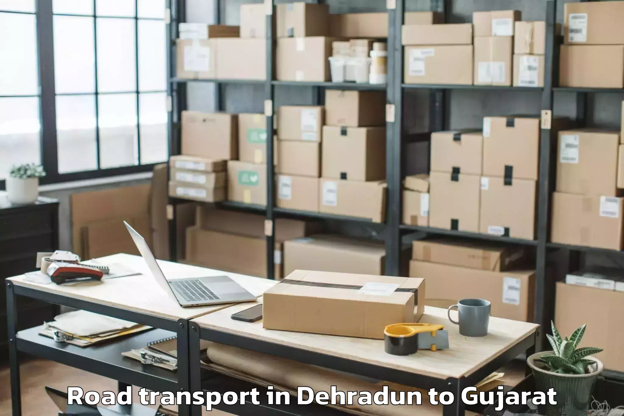 Top Dehradun to Chhota Udepur Road Transport Available